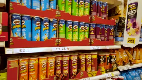 A-mass-array-of-processed-snack-or-'junk'-foods-on-shelf-of-a-British-supermarket,-blamed-for-obesity-of-people-in-Britain