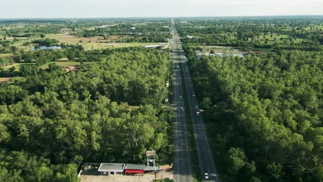 Arial-view-of-Mittraphap-road-is-the-main-road-in-inter-provincial-traffic-in-the-Northeastern-region-of-Khon-Kaen,-Thailand
