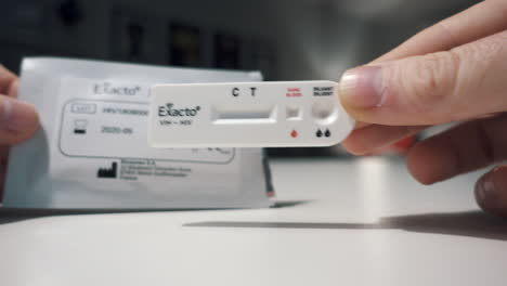 removing-a-home-HIV-test-out-of-its-packaging
