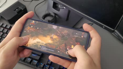 Playing-Diablo-Immortal-mobile-game-on-mobile-phone