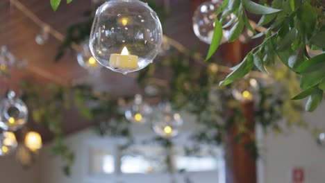 Lightbulbs-hang-from-ceiling-at-wedding-reception