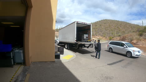 Time-lapse-of-equipment-being-unloaded-from-a-truck