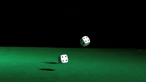 Animation-of-dices-falling-on-black-background