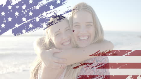 Animation-of-flag-of-usa-and-stars-over-caucasian-female-friends-on-beach