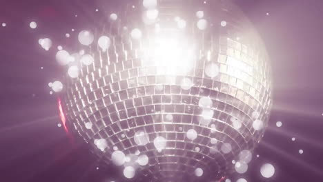 Animation-of-glowing-light-spots-moving-on-seamless-loop-over-disco-mirror-ball