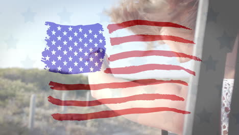 Animation-Der-Flagge-Der-USA-über-Einer-Kaukasischen-Frau-Im-Auto-Am-Strand