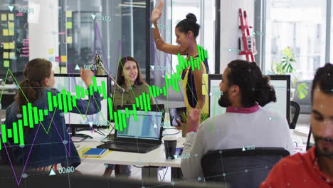 Animation-of-green-graph-processing-data-over-diverse-colleagues-high-fiving-at-casual-office