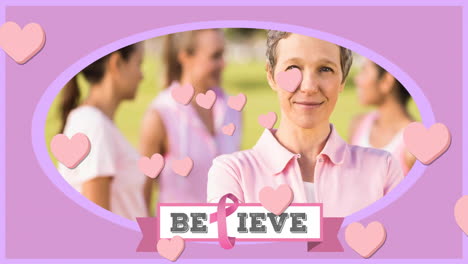 Animation-of-hearts-and-believe-text-over-caucasian-women-wearing-pink-shirts