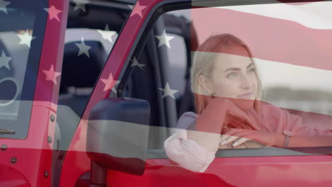 Animation-of-flag-of-usa-over-caucasian-woman-by-car-on-beach