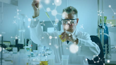 Animation-of-molecules-over-caucasian-male-scientist-working-in-lab