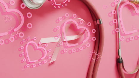 Animation-of-hearts-over-pink-ribbon-and-stethoscope-on-pink-background
