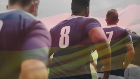 Animation-of-flag-of-germany-over-diverse-rugby-players-on-field