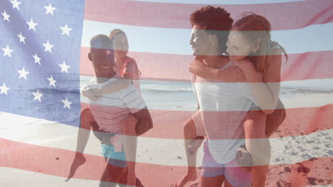 Animation-of-flag-of-usa-over-happy-diverse-men-carrying-women-piggyback-on-beach-in-summer