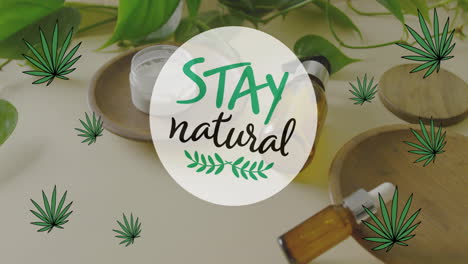 Animation-Von-„Stay-Natural“-Text-Und-Blättern-über-Bio-Schönheitscreme-Und-Flaschenölen