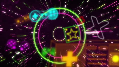 Animation-Von-Neon-Gaming-Symbolen-über-Lichtspuren-Auf-Schwarzem-Hintergrund