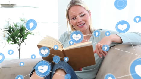 Animation-of-network-of-connections-with-icons-over-caucasian-woman-reading-book