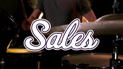 Animation-of-sales-text-over-caucasian-man-playing-drums