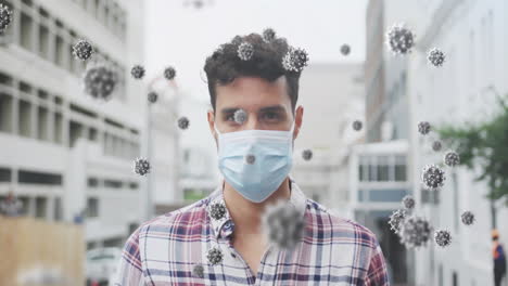 Animation-of-virus-cells-over-biracial-man-wearing-face-mask