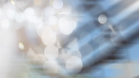 Animation-of-light-spots-and-shapes-on-blurred-background