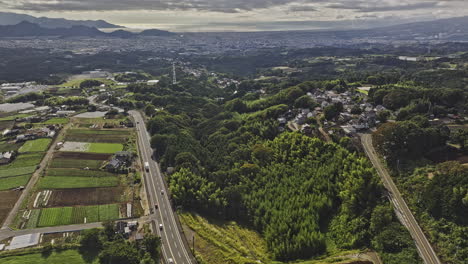 Mishima-Japan-Aerial-v3-cinematic-drone-flyover-Sasahara-Shinden-capturing-agricultural-farmlands,-hillside-landscape,-cityscape-and-Suruga-bay-views---Shot-with-Mavic-3-Pro-Cine---October-2023