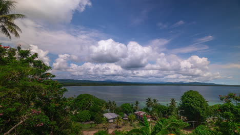 Tropical-village-coconut-palm-tree-tide-South-Pacific-Ccean-bay-Wewak-East-Sepik-River-Province-capital-district-Papua-New-Guinea-Timelapse-clouds-sunshine-sunny-daytime-islands-Madang-Northern-Coast