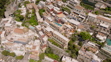 Aerial:-Slow-panning-drone-shot-of-houses-and-hotels-at-Positano-in-Amalfi-coast-of-Italy