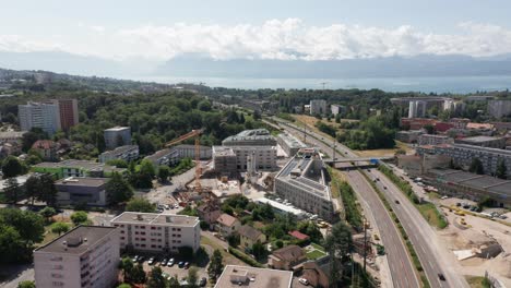 Stunning-aerial-overview-of-construction-site-with-newly-built-industrial-buildings-with-photovoltaic-solar-panels-on-rooftops