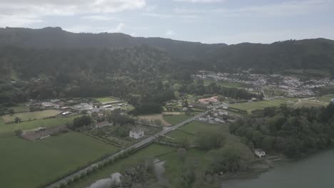 Sete-cidades,-portugal-showcasing-lush-greenery-and-serene-lake,-aerial-view