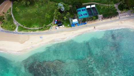 Overhead-drone-shot-of-pickle-ball-courts-and-the-Castle-Waikiki-Shore-hotel-in-Oahu