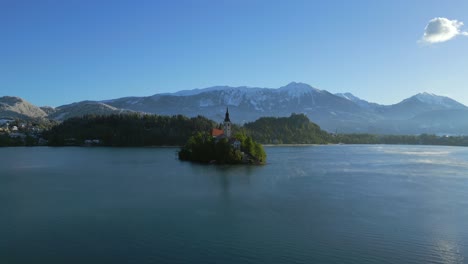 The-Church-of-the-Assumption-of-Mary-on-a-small-island-in-the-middle-of-the-calm-lake-Bled-in-Slovenia
