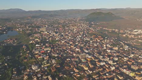 Wide-aerial-drone-view-of-African-city-with-houses-on-sunny-morning