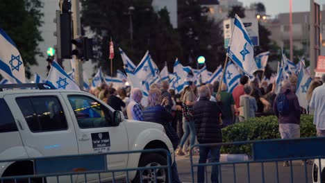 Editorial-Haifa,-Israel---05-25-2024:-People-with-signs-calling-for-peace-talk,-ceasefire-and-hostage-deal,-protest-march-near-Horev-center-Haifa,-Israel