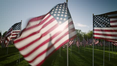 American-Flags-at-Sunset-Slow-Motion-Close-Up-with-Sunbursts