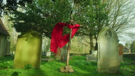 Cross-in-a-Church-Graveyard-Amongst-Tombstones