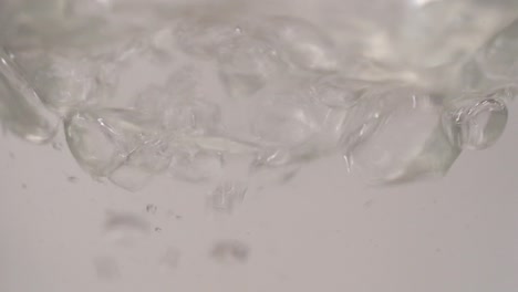 Slow-motion-footage-of-water-splashes-in-bottle