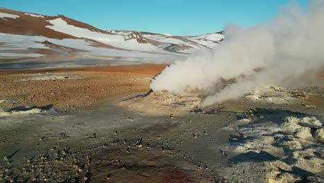 Drone-shot-of-Hverir-Steam-fields-in-Iceland-during-winter-in-the-morning