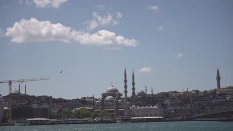 Ships,-ferries,-boats,-historical-buildings-in-the-Bosphorus,-Istanbul,-Turkiye