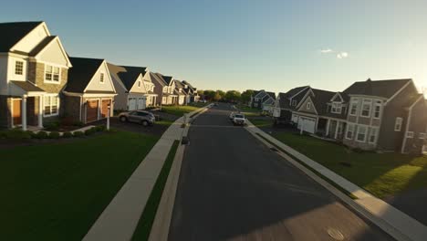 Slow-drone-flight-over-quaint-American-residential-area-with-middle-class-homes