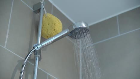 Water-dropping-from-a-shower-head-in-slow-motion