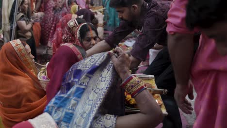 indian-devotee-worshiping-hindu-holy-sun-god-at-chhath-festival-unique-perspective-video-is-taken-at-jodhpur-rajasthan-india-on-Nov-20-2023