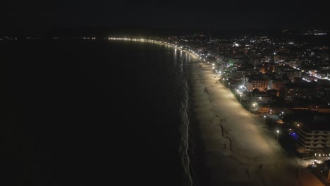 dusk-Canasvieiras-beaches-with-tourists,-Florianópolis,-Brazil