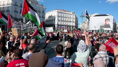 Protesters-in-solidarity-with-Palestine-gathered-at-Puerta-del-Sol-demanding-that-the-Spanish-government-stop-weapons-commerce-to-the-State-of-Israel-in-Madrid,-Spain