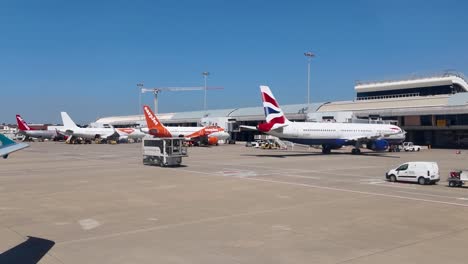 A-4K-shot-of-the-aircraft-pulling-back-from-the-stand-at-Faro-Airport-before-take-off