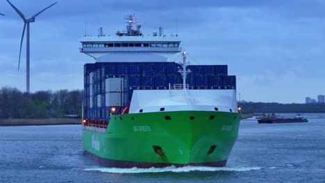 Oude-Maas-river-cargo-vessel-BG-Green-sails,-beautiful-aerial-footage