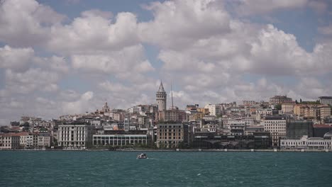 Ships,-ferries,-boats,-historical-buildings-in-the-Bosphorus,-Istanbul,-Turkiye