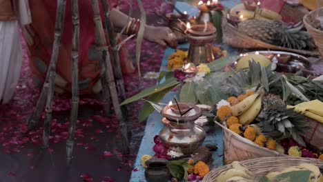 holy-religious-offerings-with-oil-lamp-and-fruits-for-hindu-sun-god-at-chhath-festival