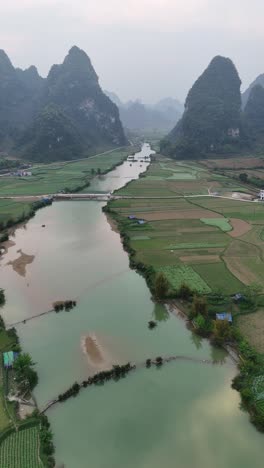 Cao-Bang-Rural-Landscape,-Vietnam---Rivers-and-Karst-Mountains,-vertical