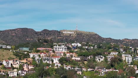 Distant-drone-shot-panning-to-the-right-and-showing-the-Hollywood-sign