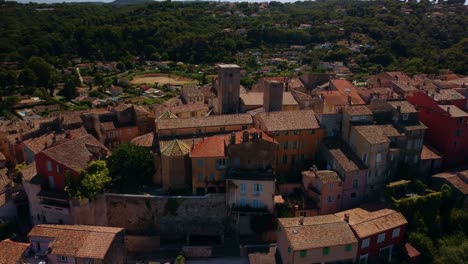 Sunrise,-village-rooftops,-cultural-attractive-tourist-destination,-aerial