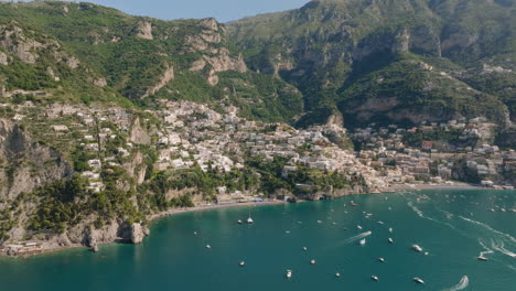 Aerial:-Panoramic-drone-shot-of-Positano-on-Amalfi-coast,-Italy-on-a-sunny-day